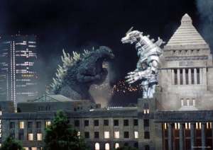 A still from the film Godzilla: Tokyo SOS. Godzilla faaces off against Kiryu (Mechagodzilla) in a cityscape.
