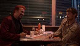 Nicolas Cage and Joel Kinnaman in SYMPATHY FOR THE DEVIL