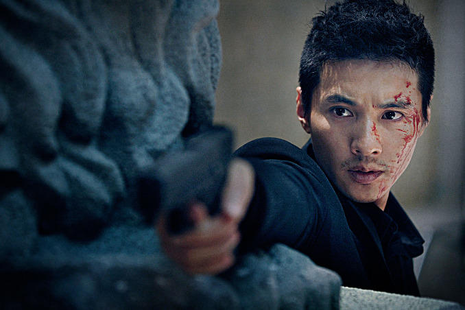 The purpose of this image, credited to CJ Entertainment, is to highlight the film's event screening for festival goers. The image shows Won Bin in a still from the movie, THE MAN FROM NOWHERE (2010)