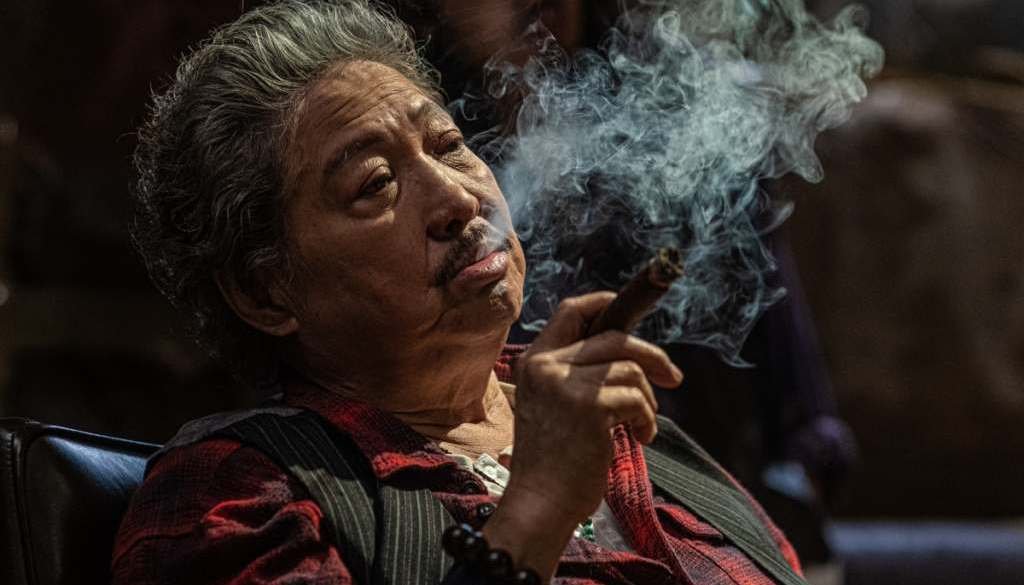Sammo Hung smoking - Twilight of the Warriors - Walled In