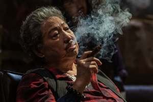 Sammo Hung smoking - Twilight of the Warriors - Walled In