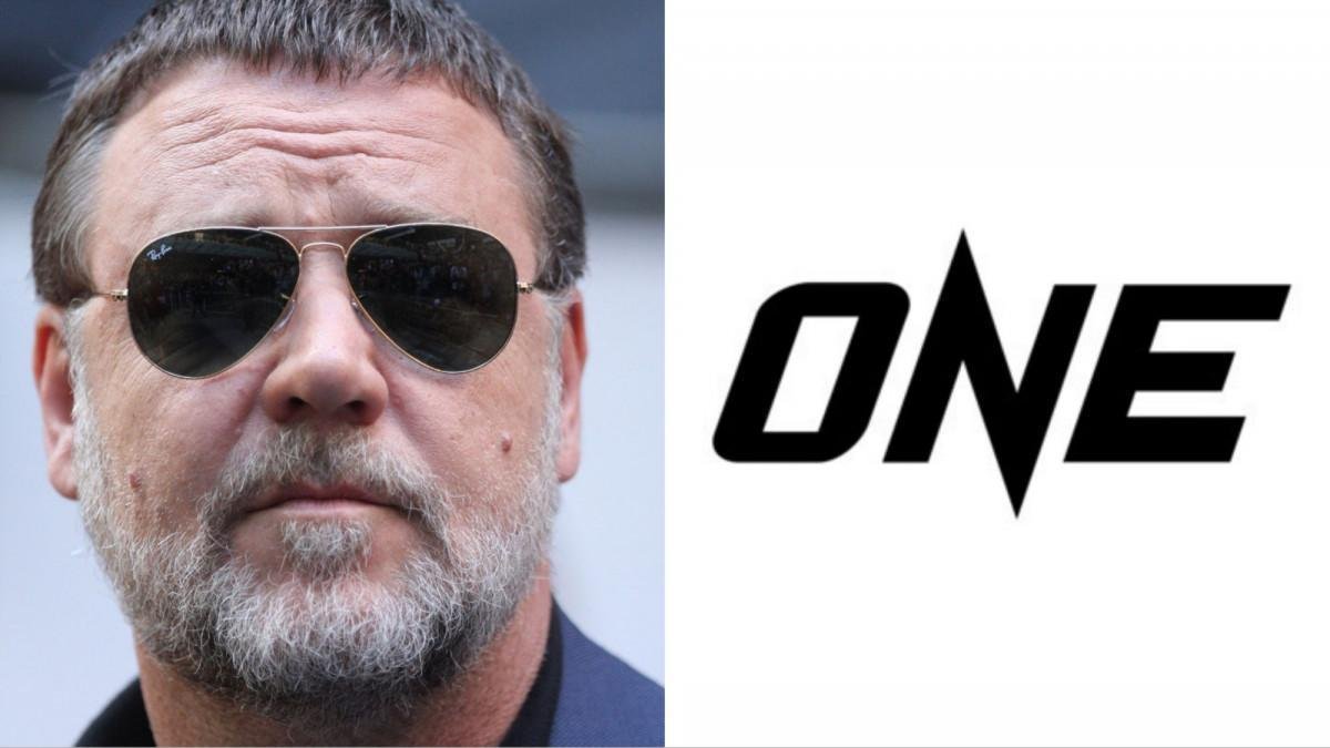 Russell Crowe wearing sunglasses on the left, ONE Championship logo on the right with the word ONE presented bold in black