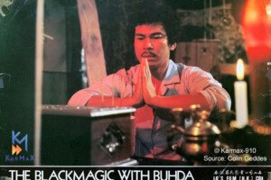 A man prays over a box as seen in a classic film