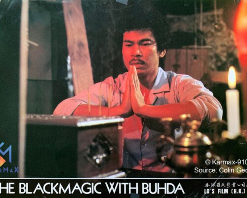 A man prays over a box as seen in a classic film