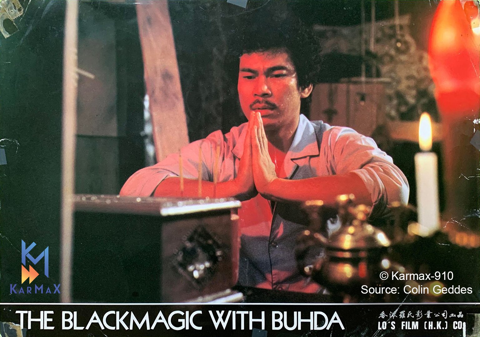 A man prays over a box as seen in a classic film