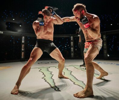 Two men performing a fight scene in a movie