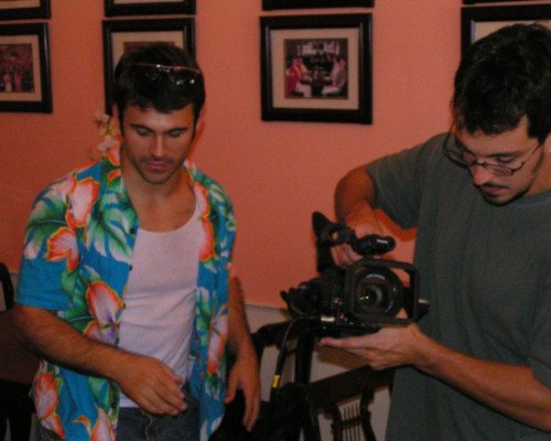 Two men making a movie on a film set.